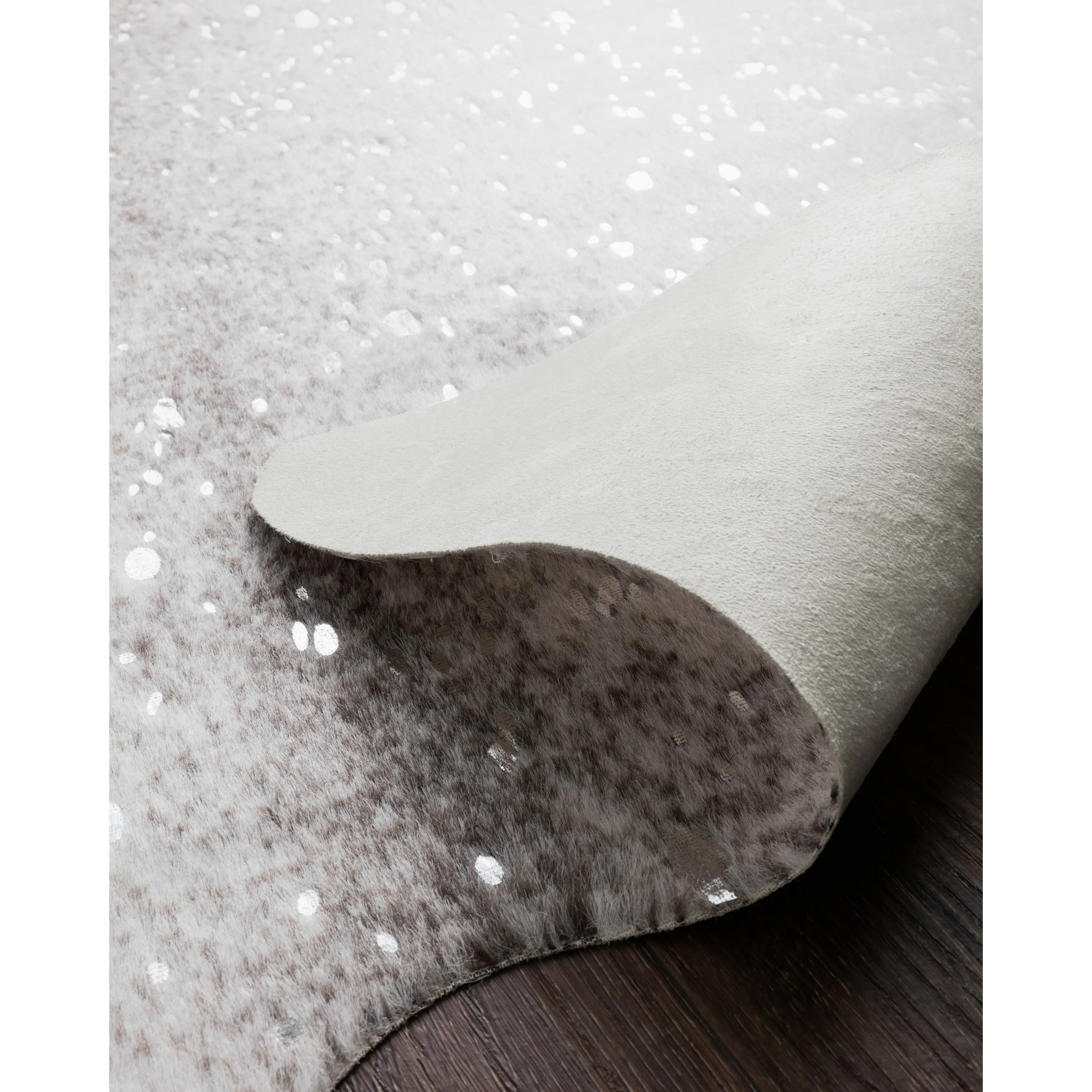 Alexander Home Clayton Faux Cowhide Area Rug