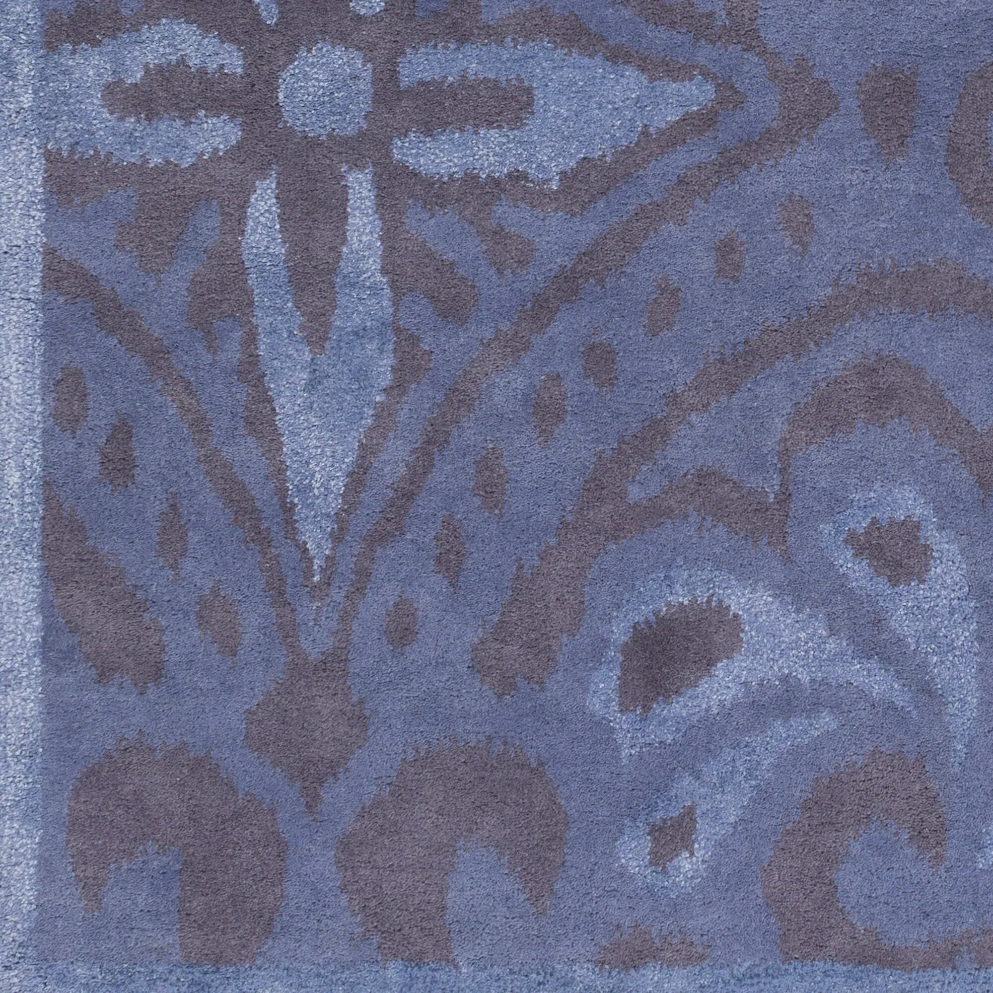 Hand-tufted Briana Ikat Indoor Area Rug