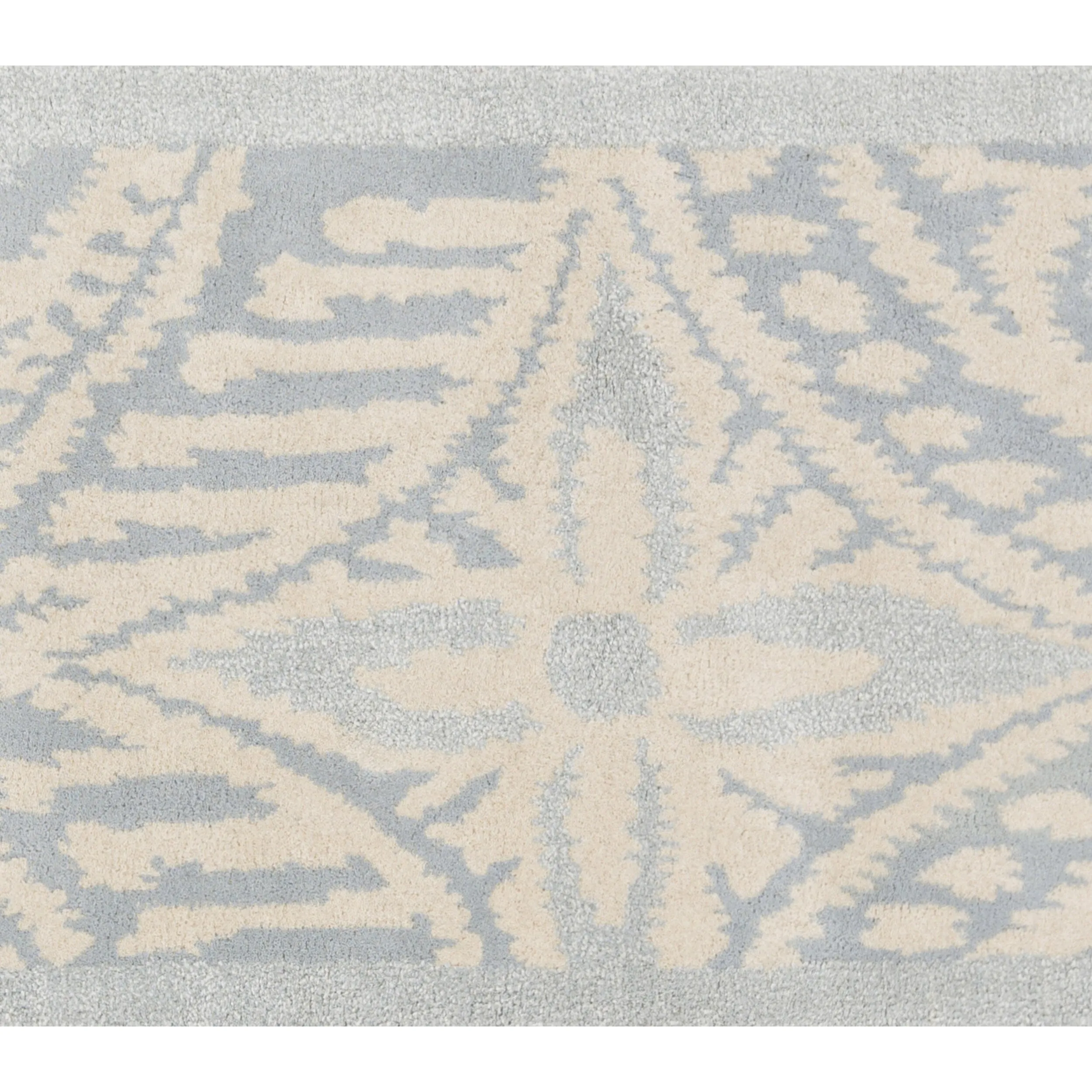 Hand-tufted Briana Ikat Indoor Area Rug