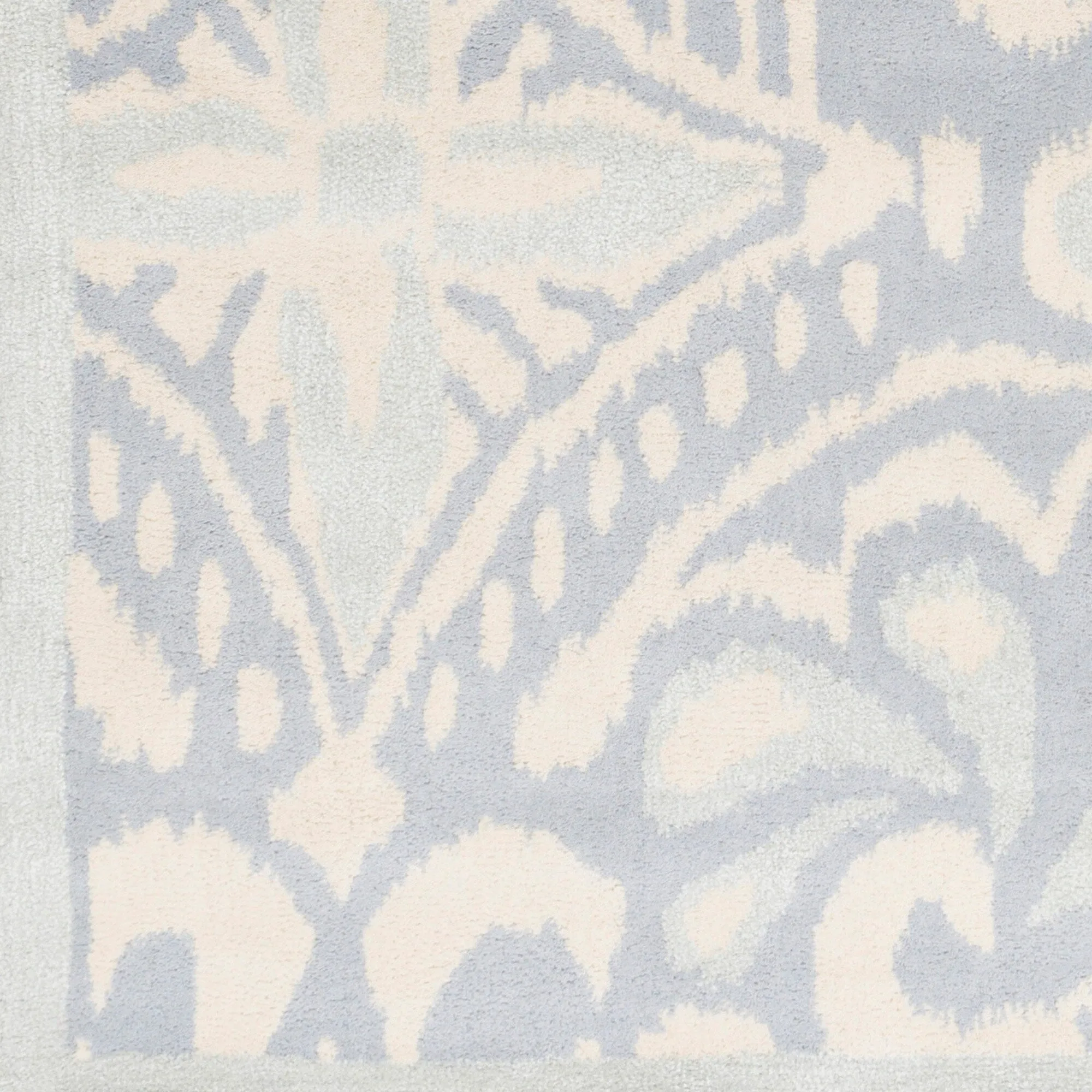 Hand-tufted Briana Ikat Indoor Area Rug