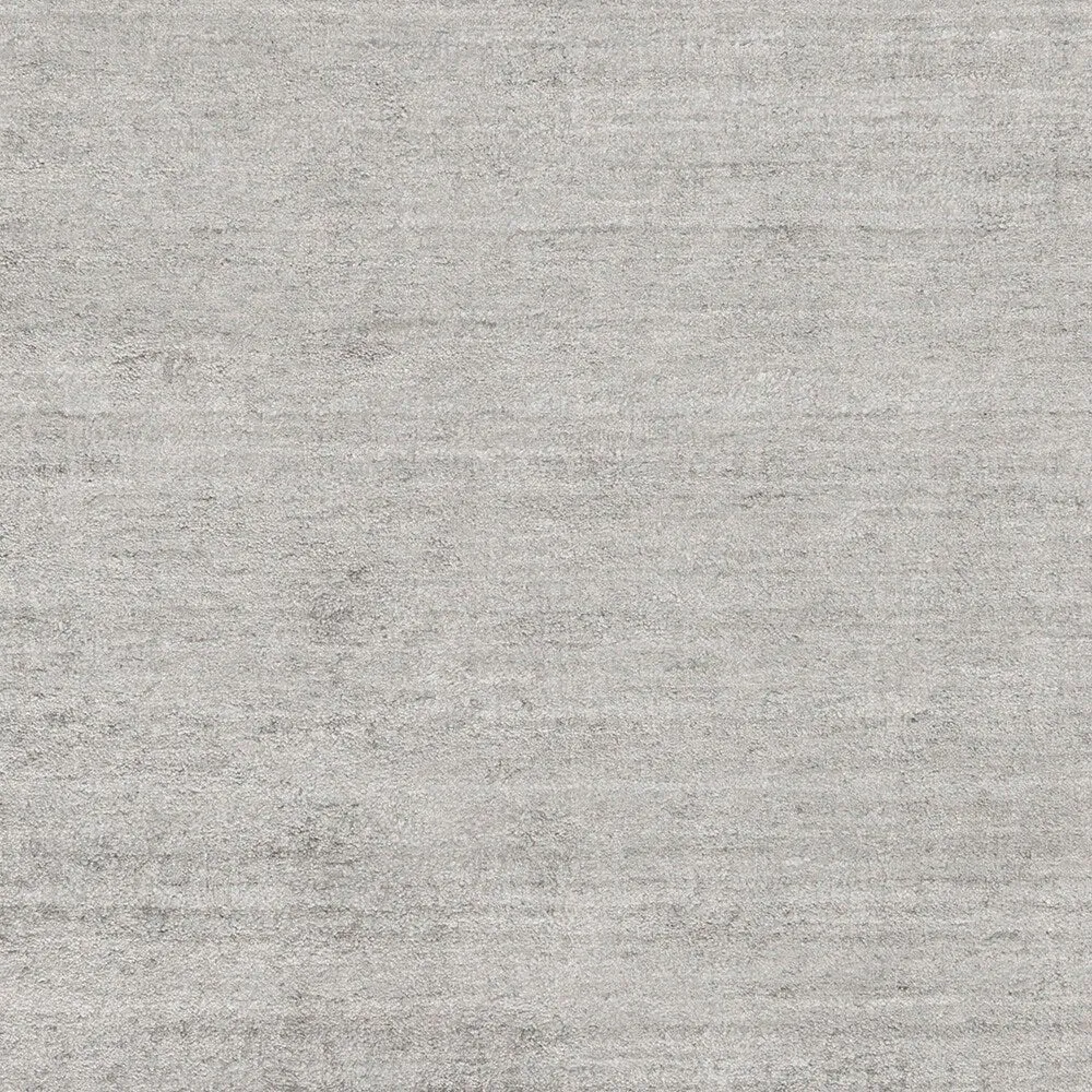 Hand-woven Dan Solid Viscose Area Rug