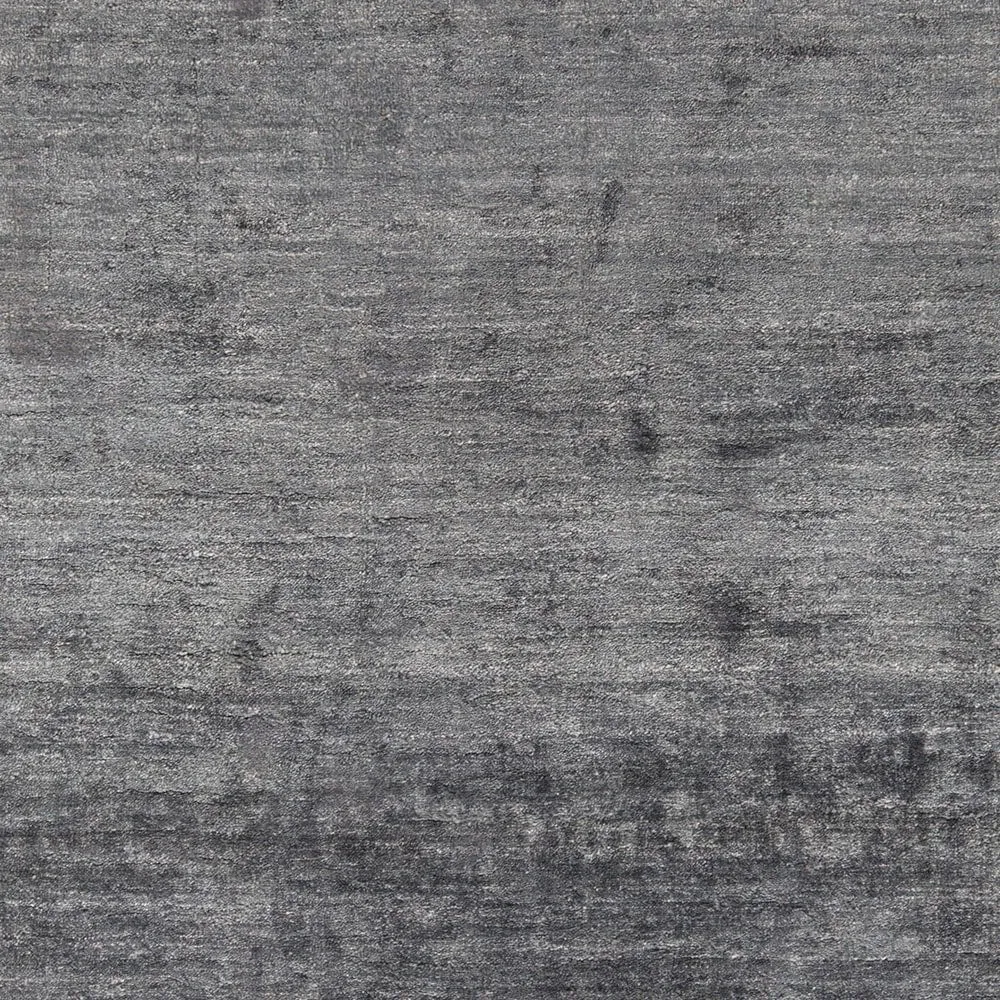 Hand-woven Dan Solid Viscose Area Rug