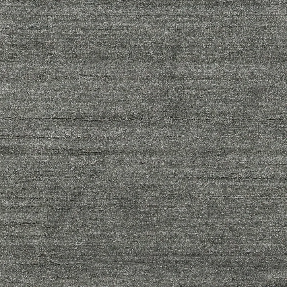 Hand-woven Dan Solid Viscose Area Rug