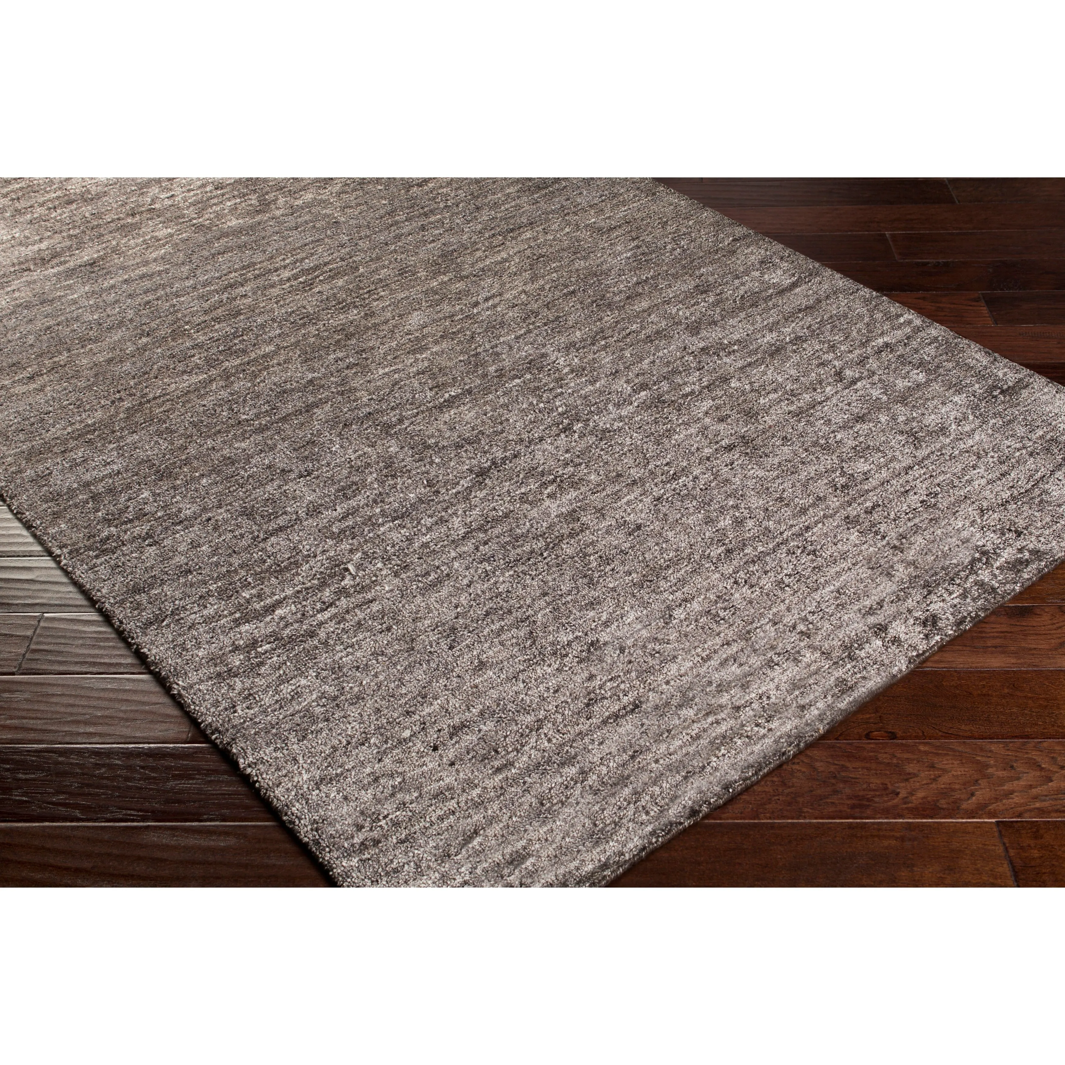 Hand-woven Dan Solid Viscose Area Rug