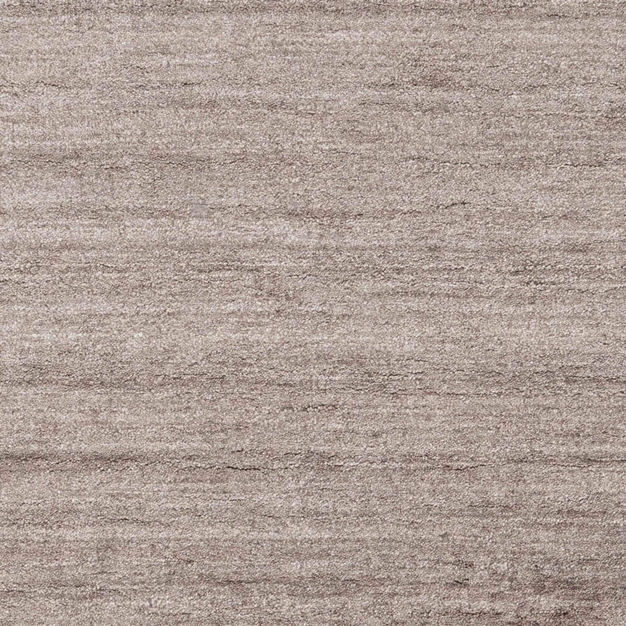Hand-woven Dan Solid Viscose Area Rug