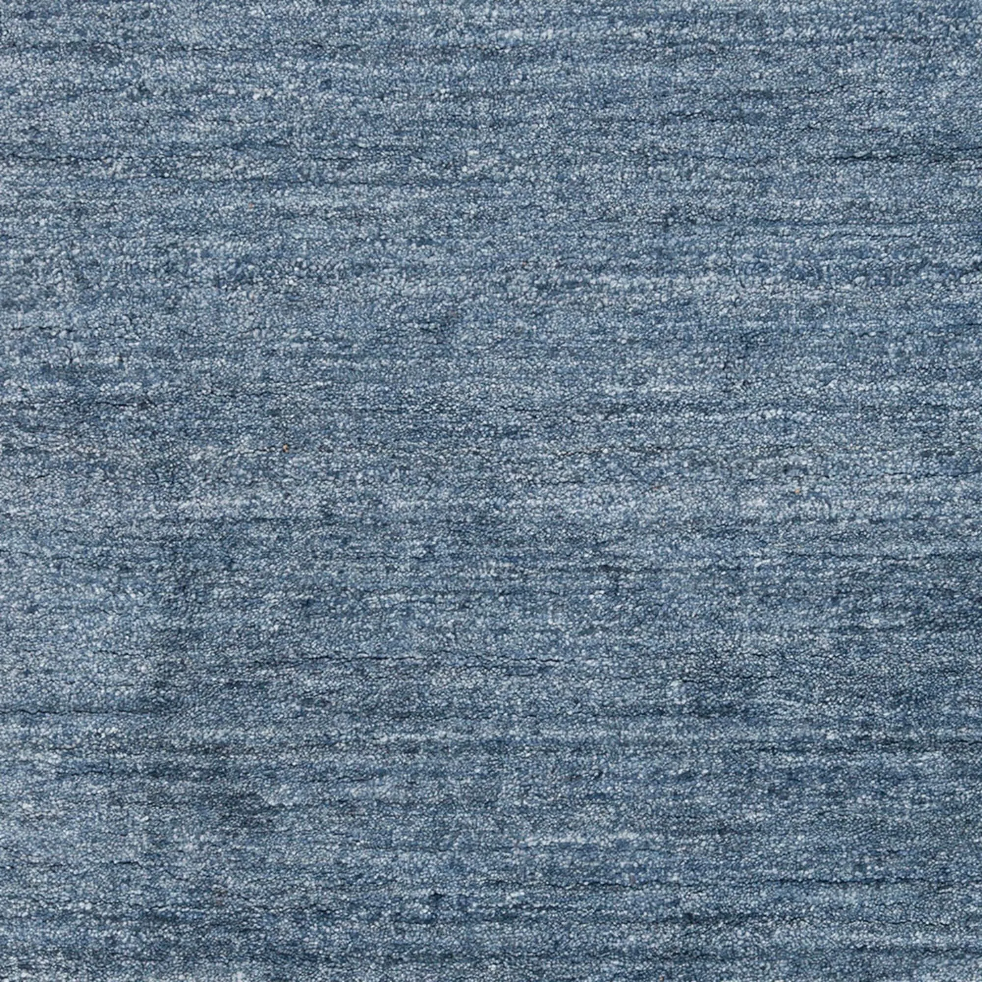 Hand-woven Dan Solid Viscose Area Rug