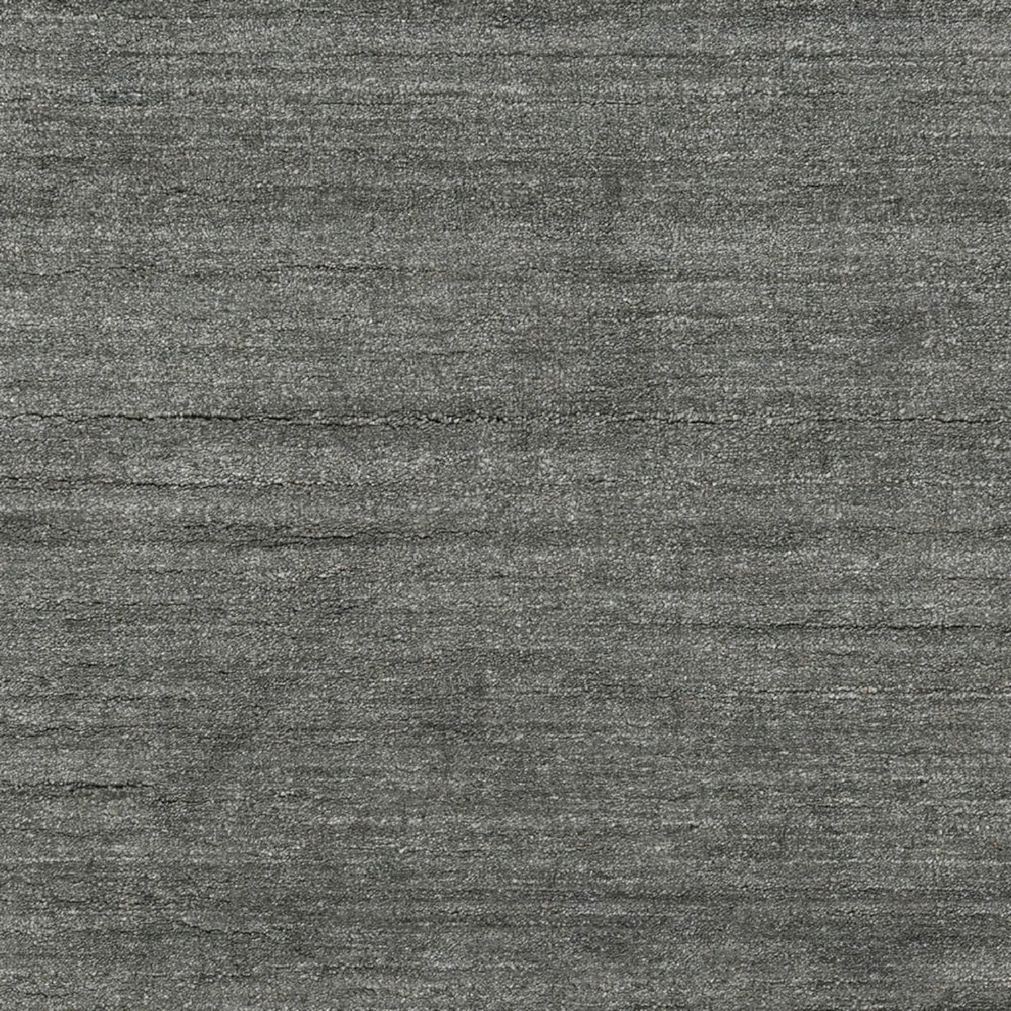 Hand-woven Dan Solid Viscose Area Rug