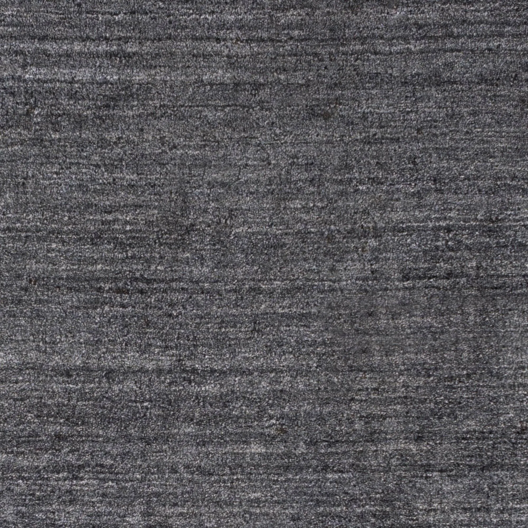 Hand-woven Dan Solid Viscose Area Rug