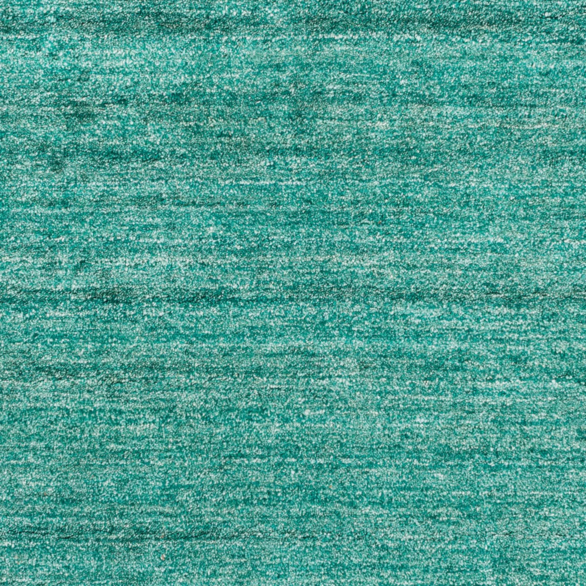 Hand-woven Dan Solid Viscose Area Rug