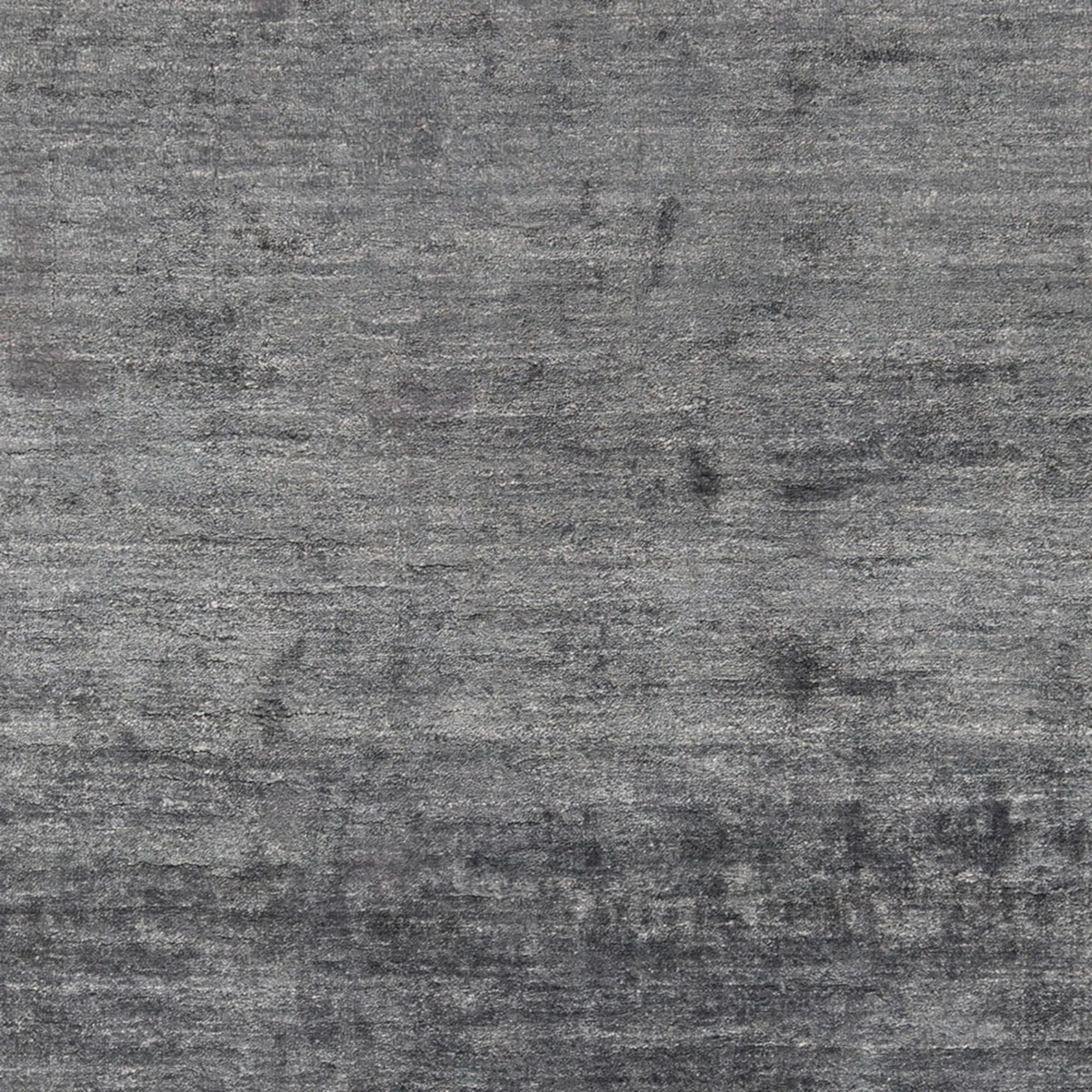 Hand-woven Dan Solid Viscose Area Rug