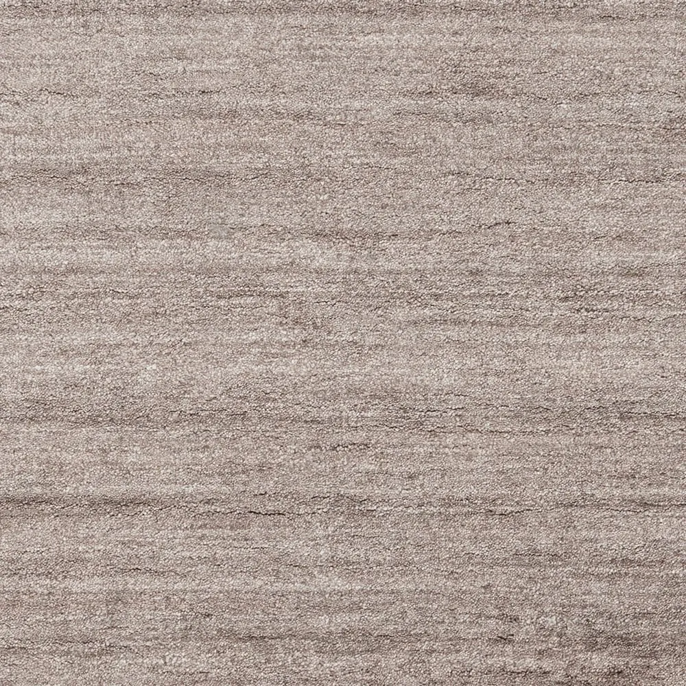 Hand-woven Dan Solid Viscose Area Rug