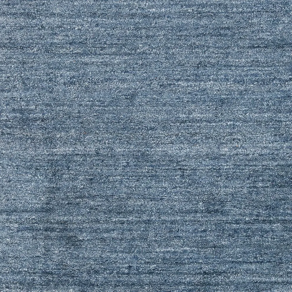 Hand-woven Dan Solid Viscose Area Rug