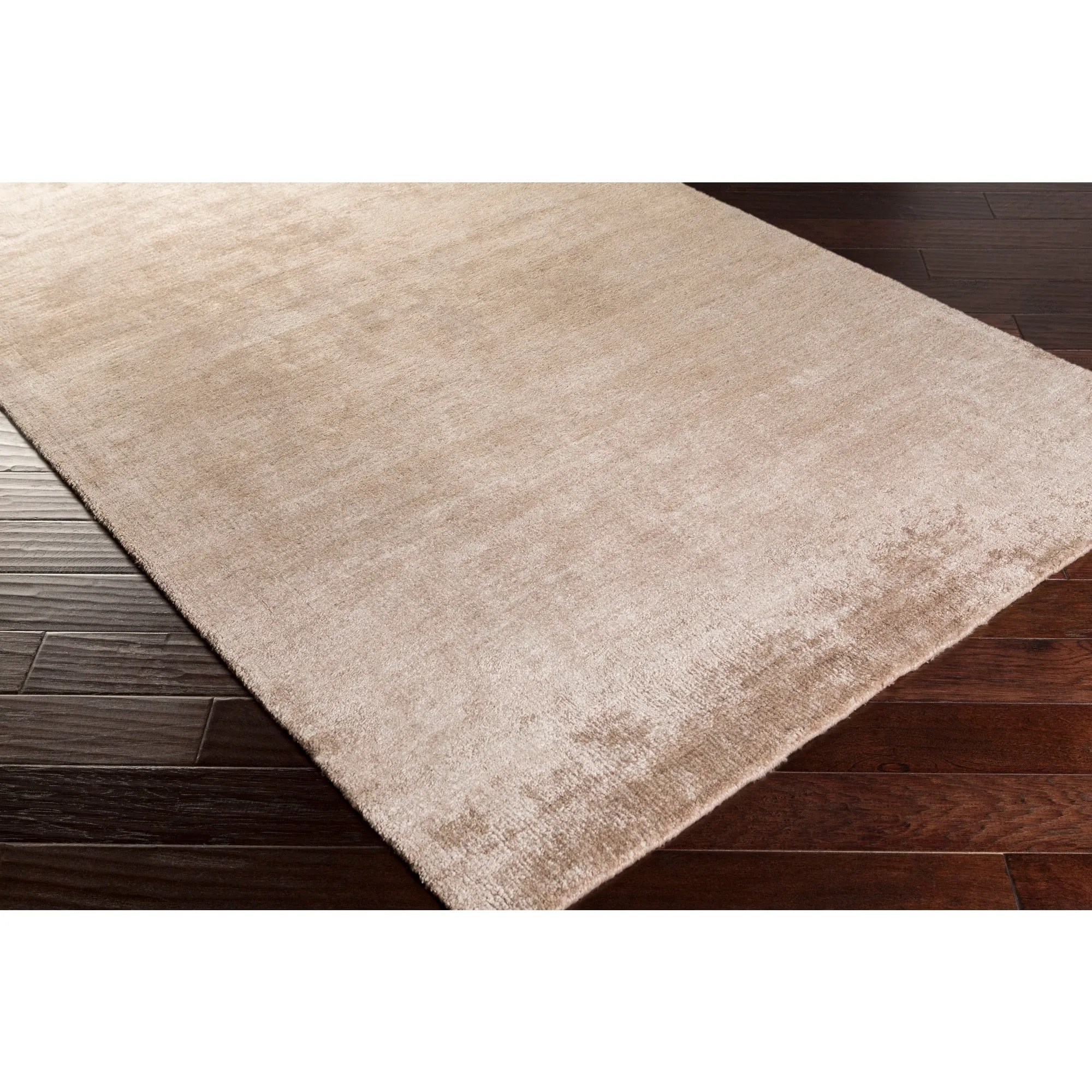 Hand-woven Dan Solid Viscose Area Rug