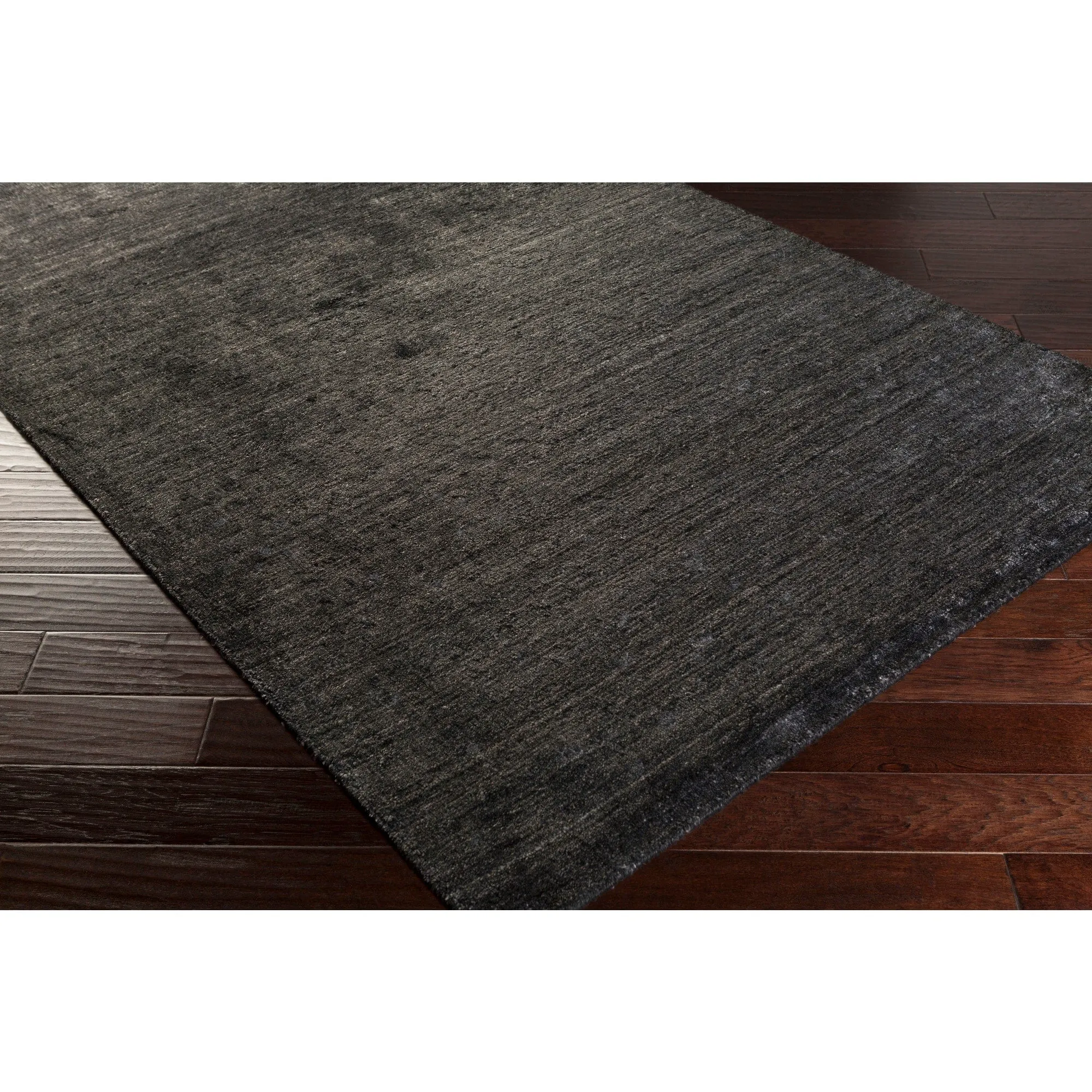 Hand-woven Dan Solid Viscose Area Rug