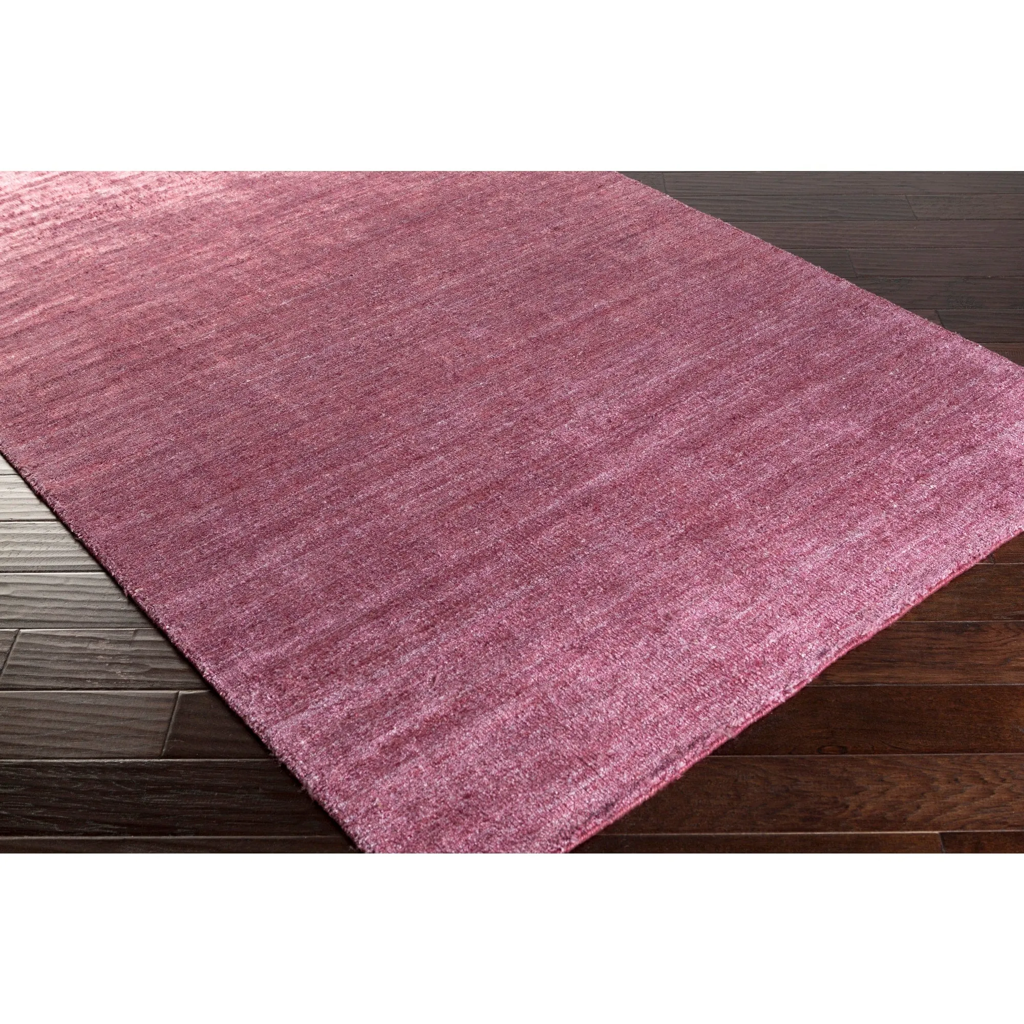 Hand-woven Dan Solid Viscose Area Rug