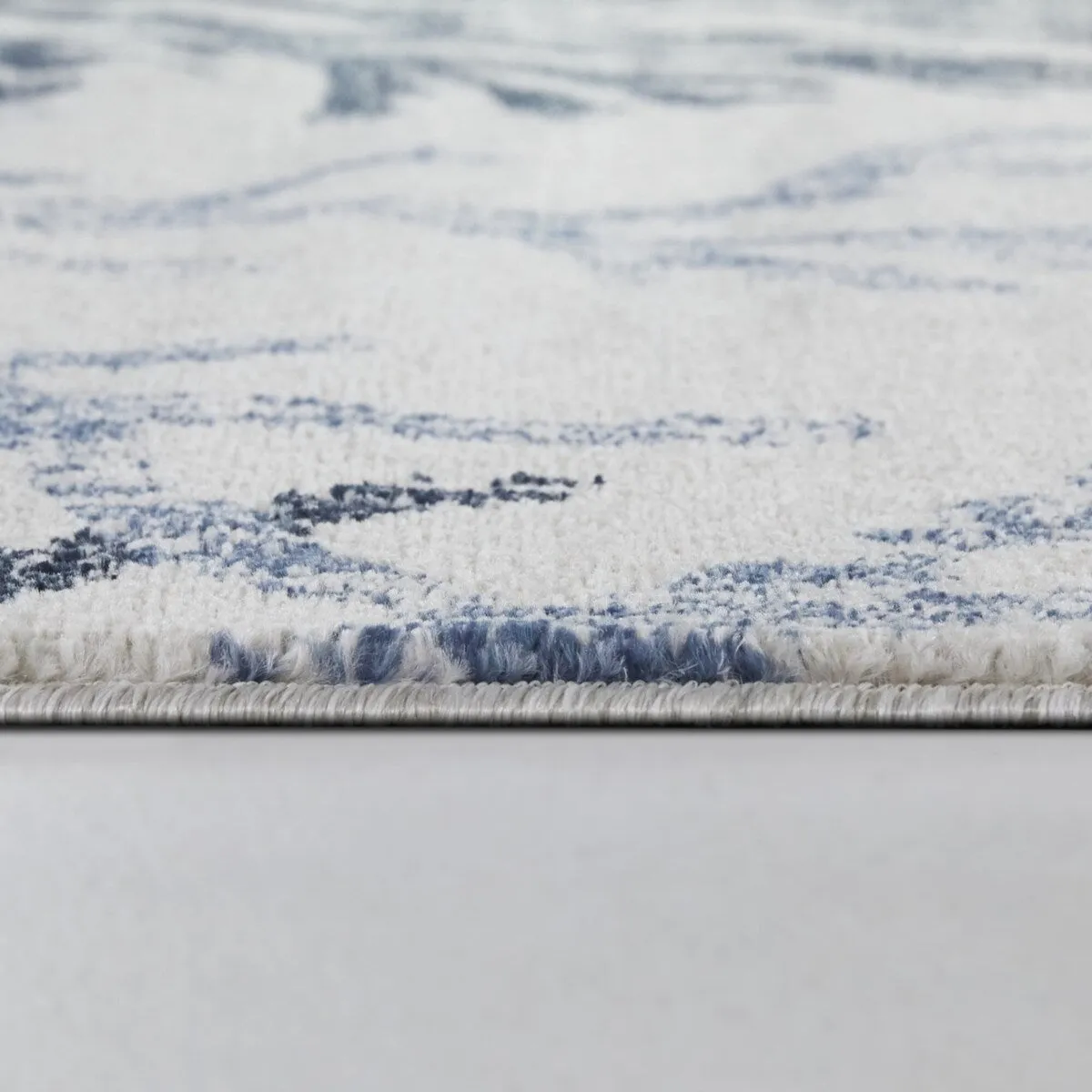Kell Coastal Coral Print Area Rug