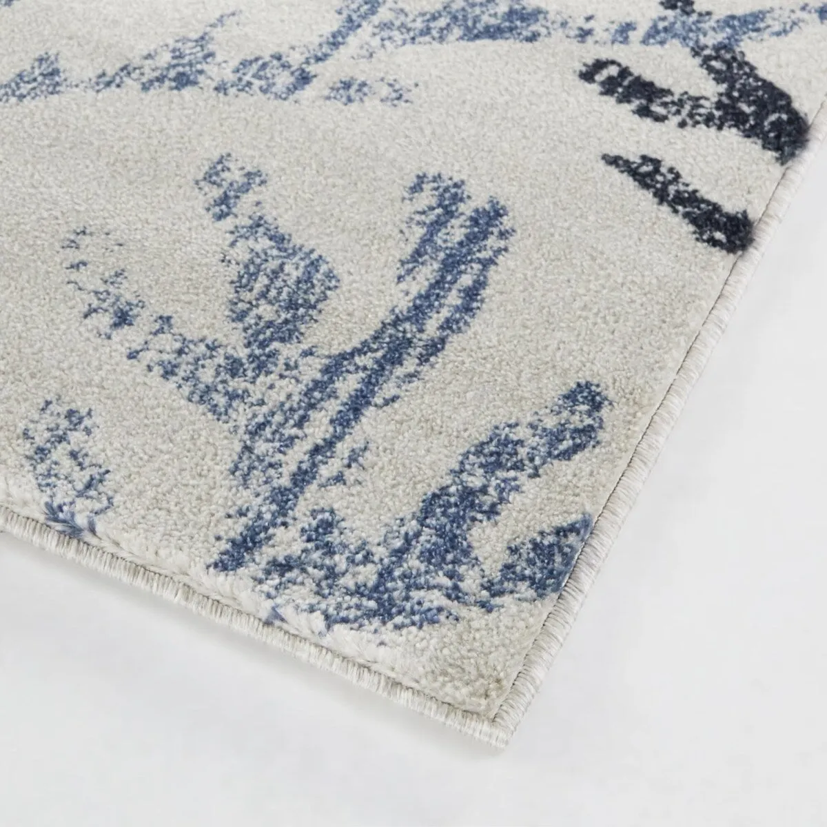 Kell Coastal Coral Print Area Rug