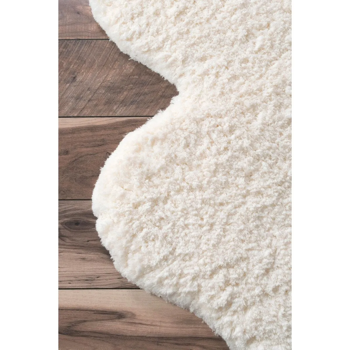 Nuloom Handmade Faux Sheepskin Shag Rug - 2' x 4'5