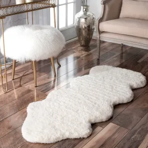 Nuloom Handmade Faux Sheepskin Shag Rug - 2' x 4'5