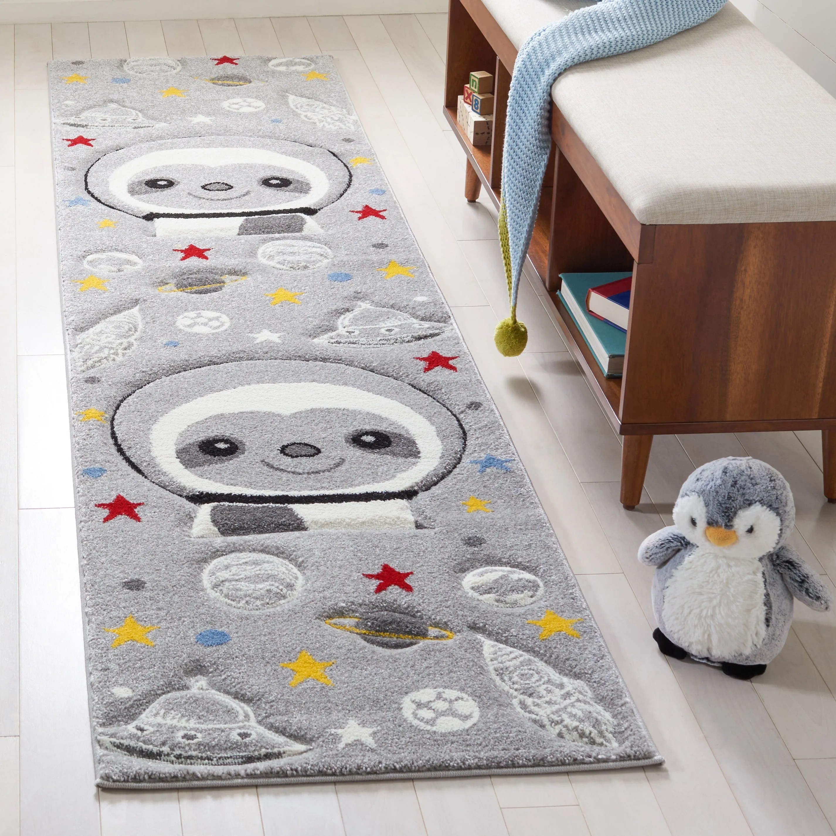 SAFAVIEH Carousel Kids Kolbrin Sloth Astronaut Rug