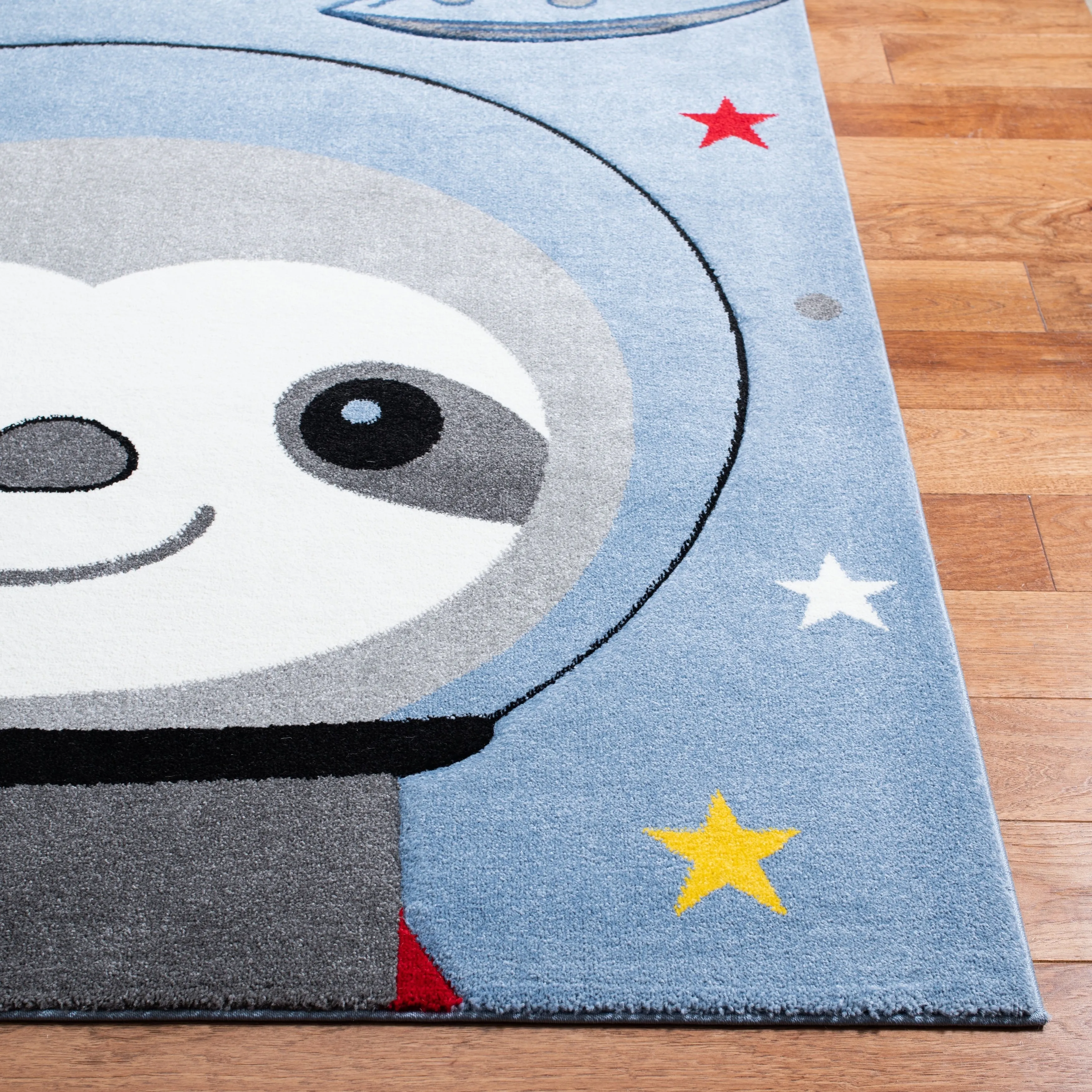 SAFAVIEH Carousel Kids Kolbrin Sloth Astronaut Rug