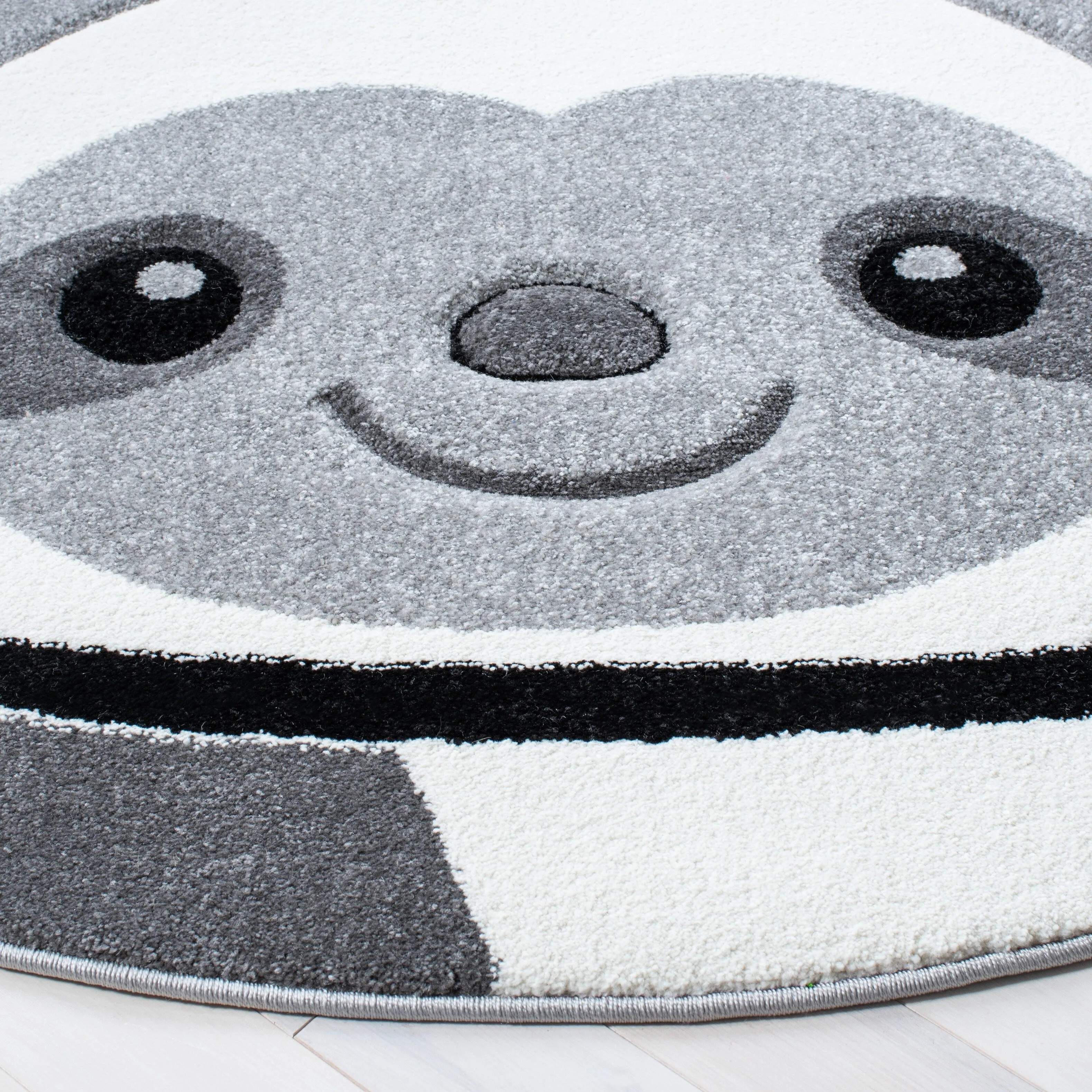 SAFAVIEH Carousel Kids Kolbrin Sloth Astronaut Rug