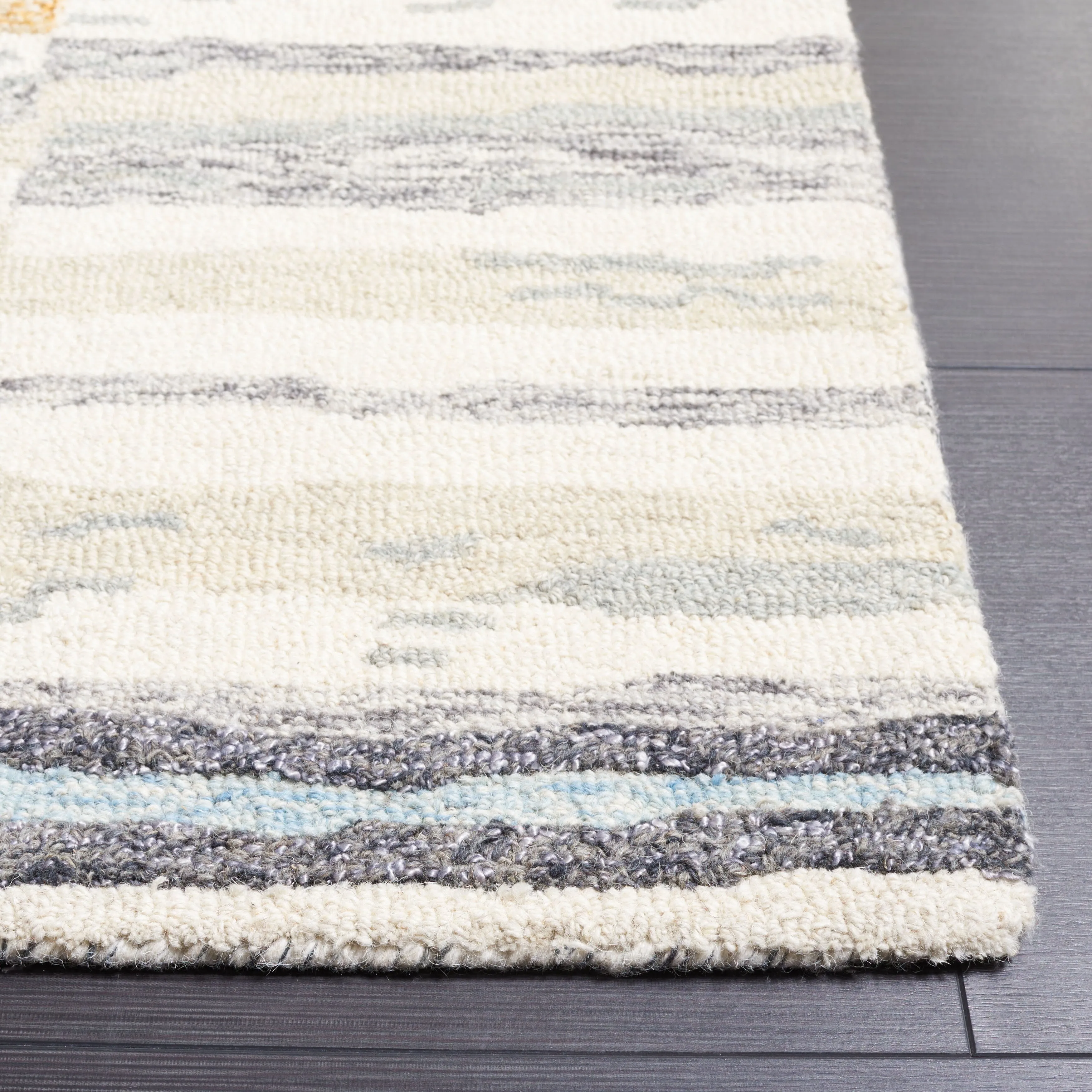 SAFAVIEH Handmade Ebony Bassima Modern Wool Rug