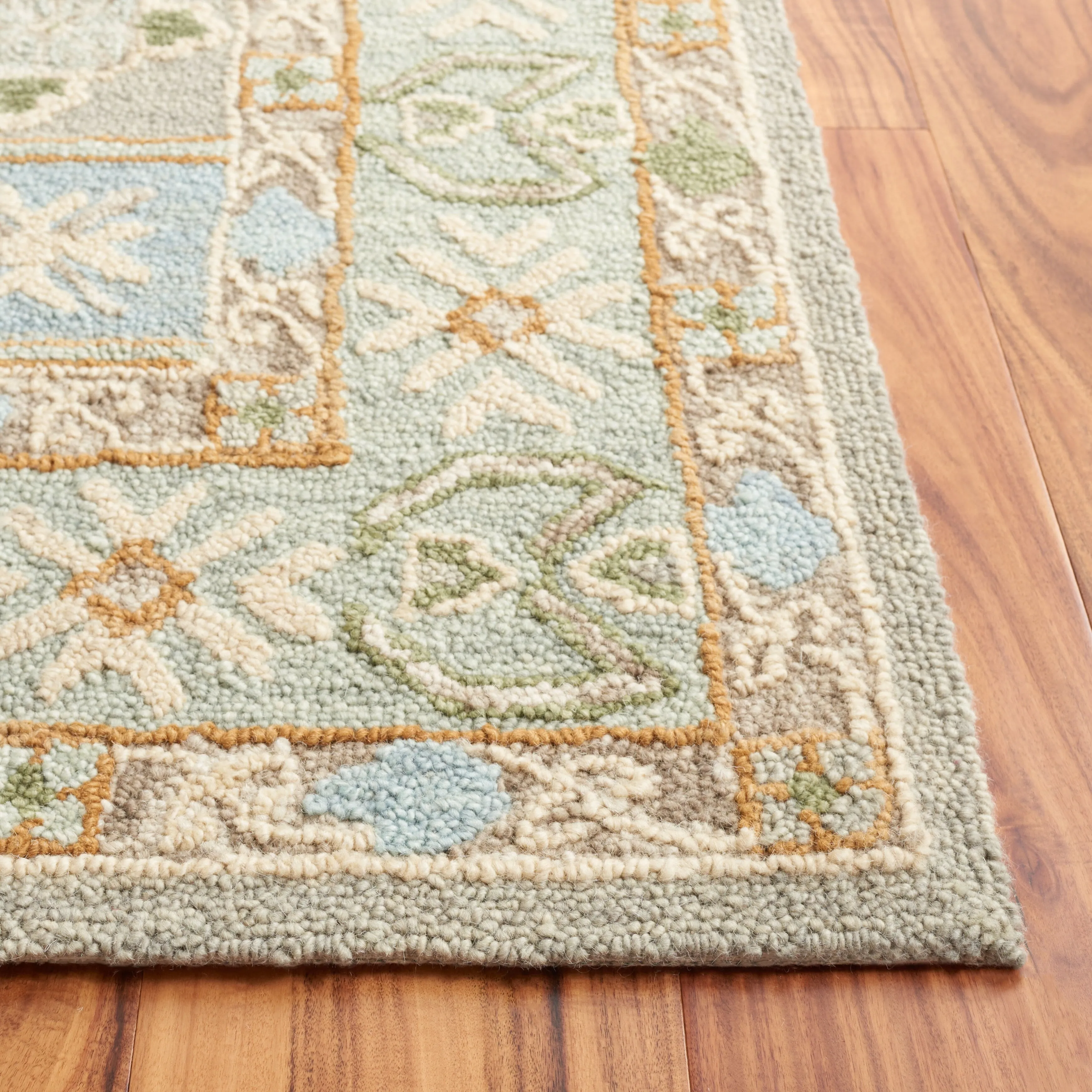 SAFAVIEH Handmade Heritage Stelia Traditional Wool Rug