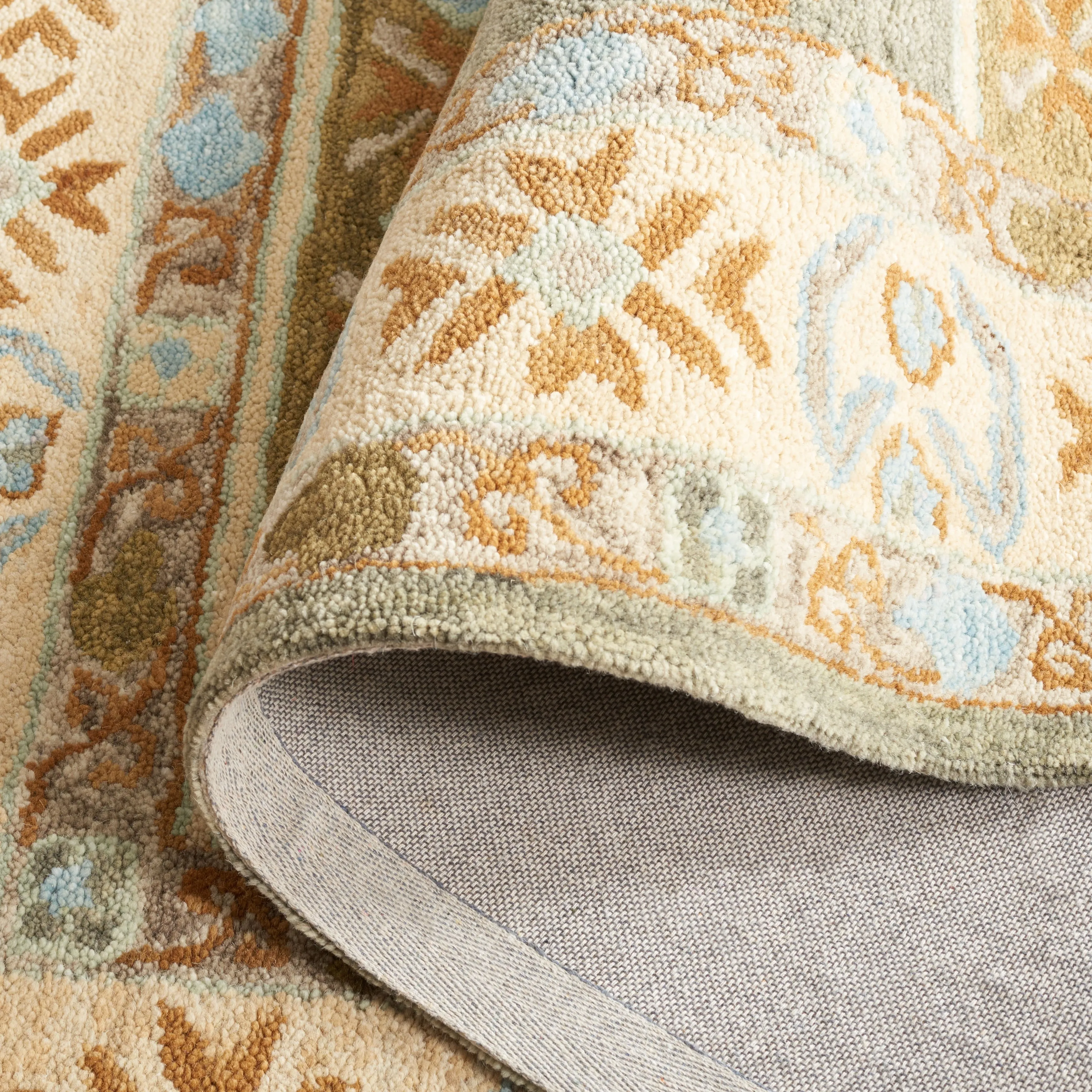 SAFAVIEH Handmade Heritage Stelia Traditional Wool Rug